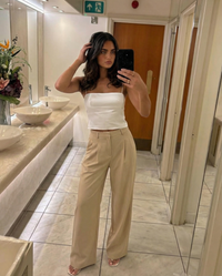 Lila | High-Waist Pleated Belt Loop Wide-Leg Linen Trousers in Cream