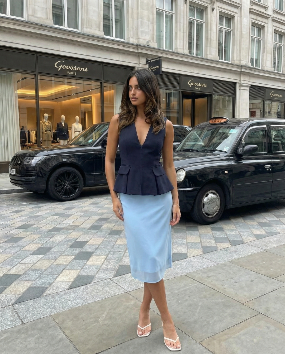 Lola | Sleeveless V-Neck Peplum Top