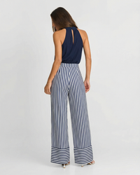 Adeline | Halter Neck Self-Tie Waist Stripe Flowing Wide-Leg Jumpsuit in Navy