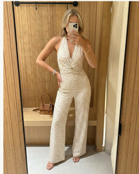 Alicia | Deep V Halter Polka Dot Twisted Bust Gold Hardware Wide-Leg Jumpsuit in Cream