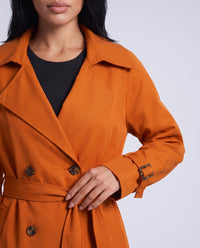 Marlowe longline belted trench coat in Orange - detail close-up