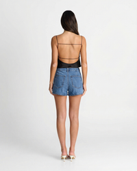 Delilah | Asymmetric Wrap-Front Denim Mini Skirt