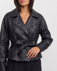 Amber cropped faux leather trench coat close-up