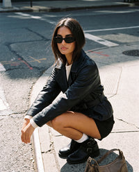 Amber cropped faux leather trench coat street style