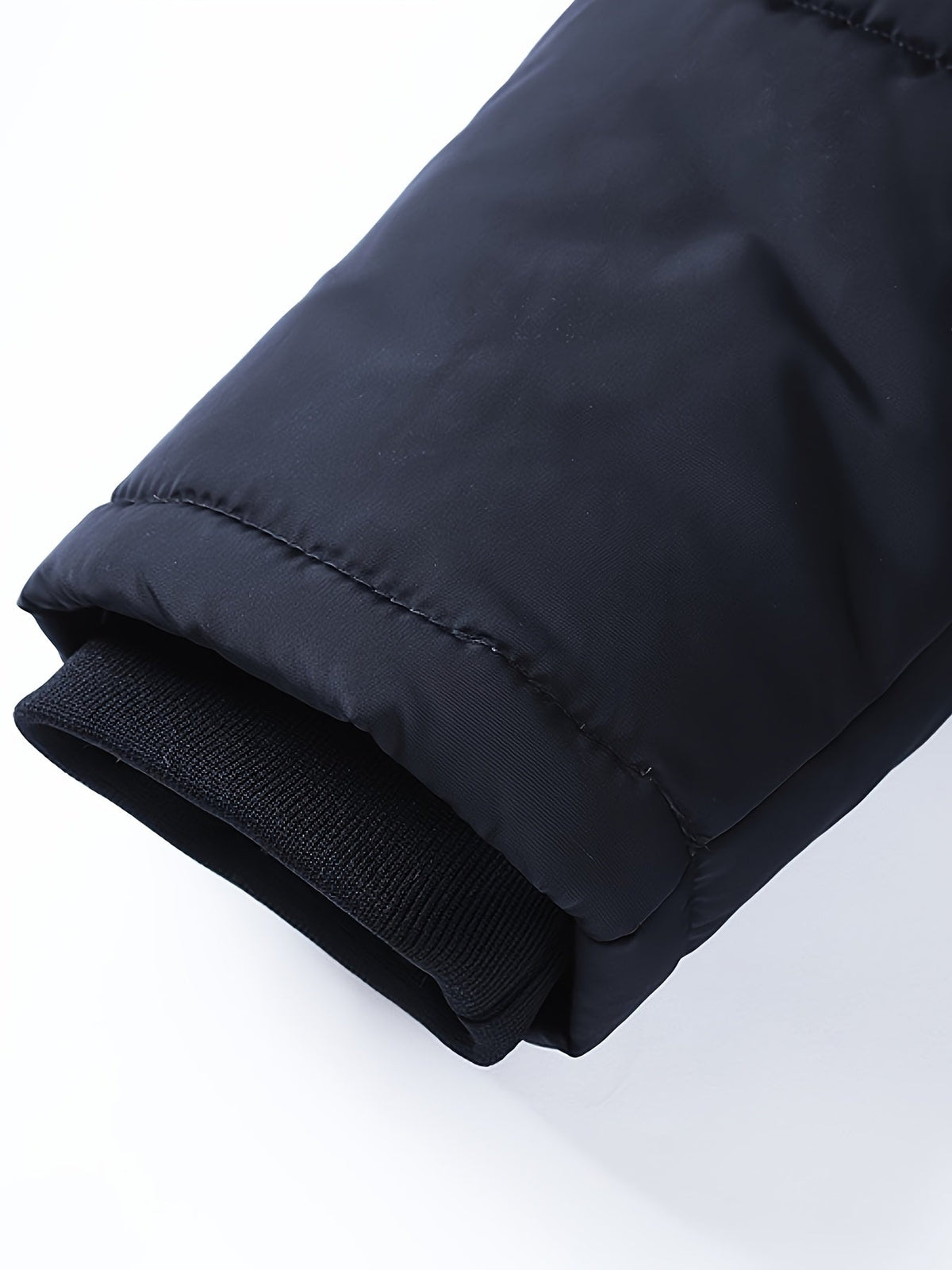Sanderson puffer jacket snap button pocket detail