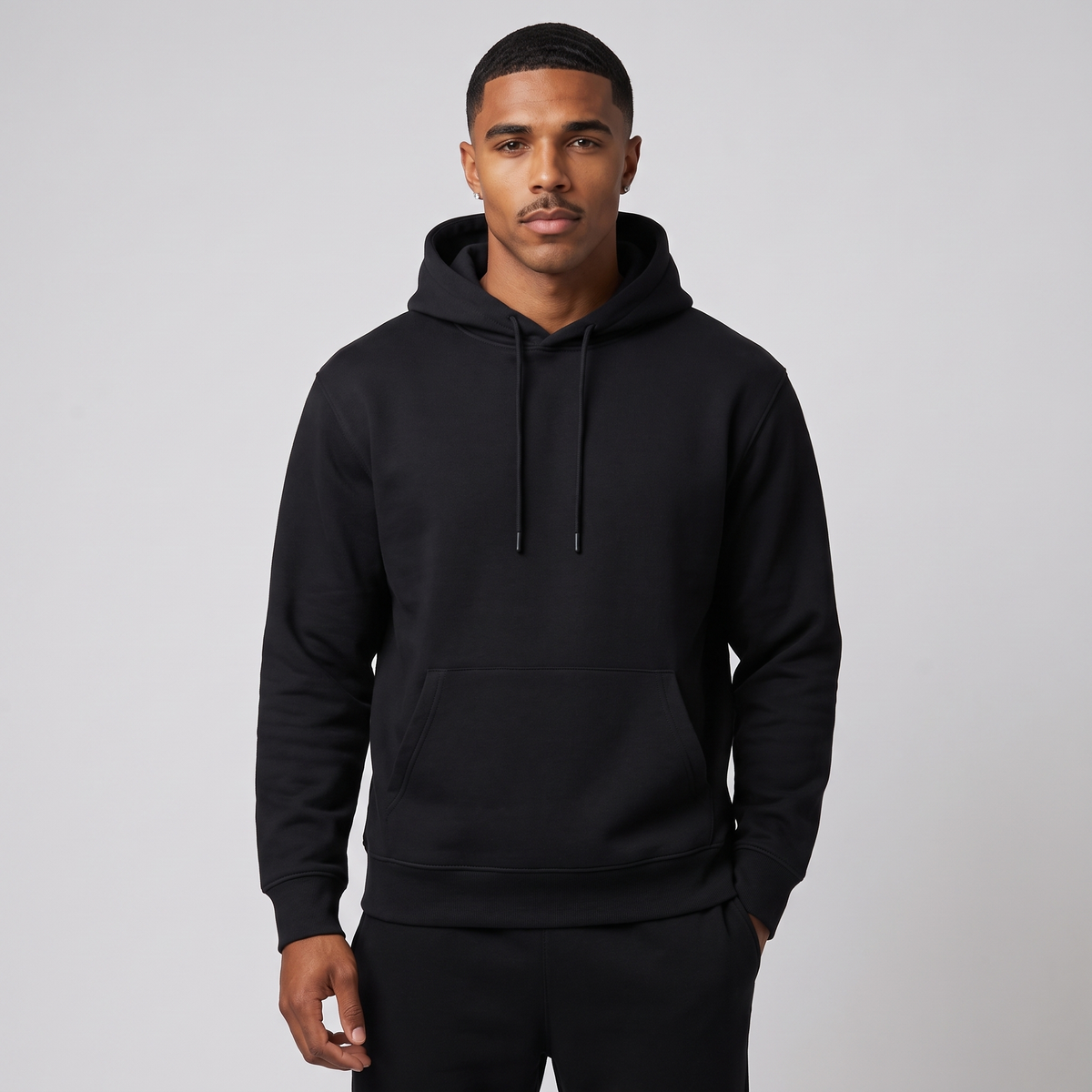 NOLA model wearing regular fit pullover hoodie
