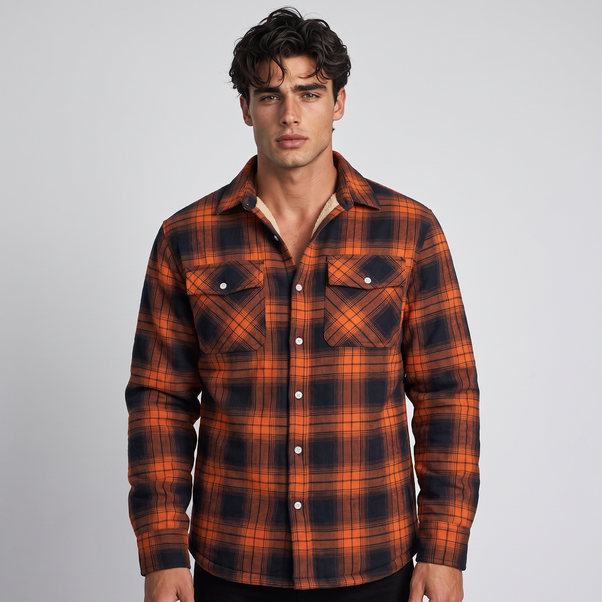NOLA model wearing sherpa lined plaid jacket