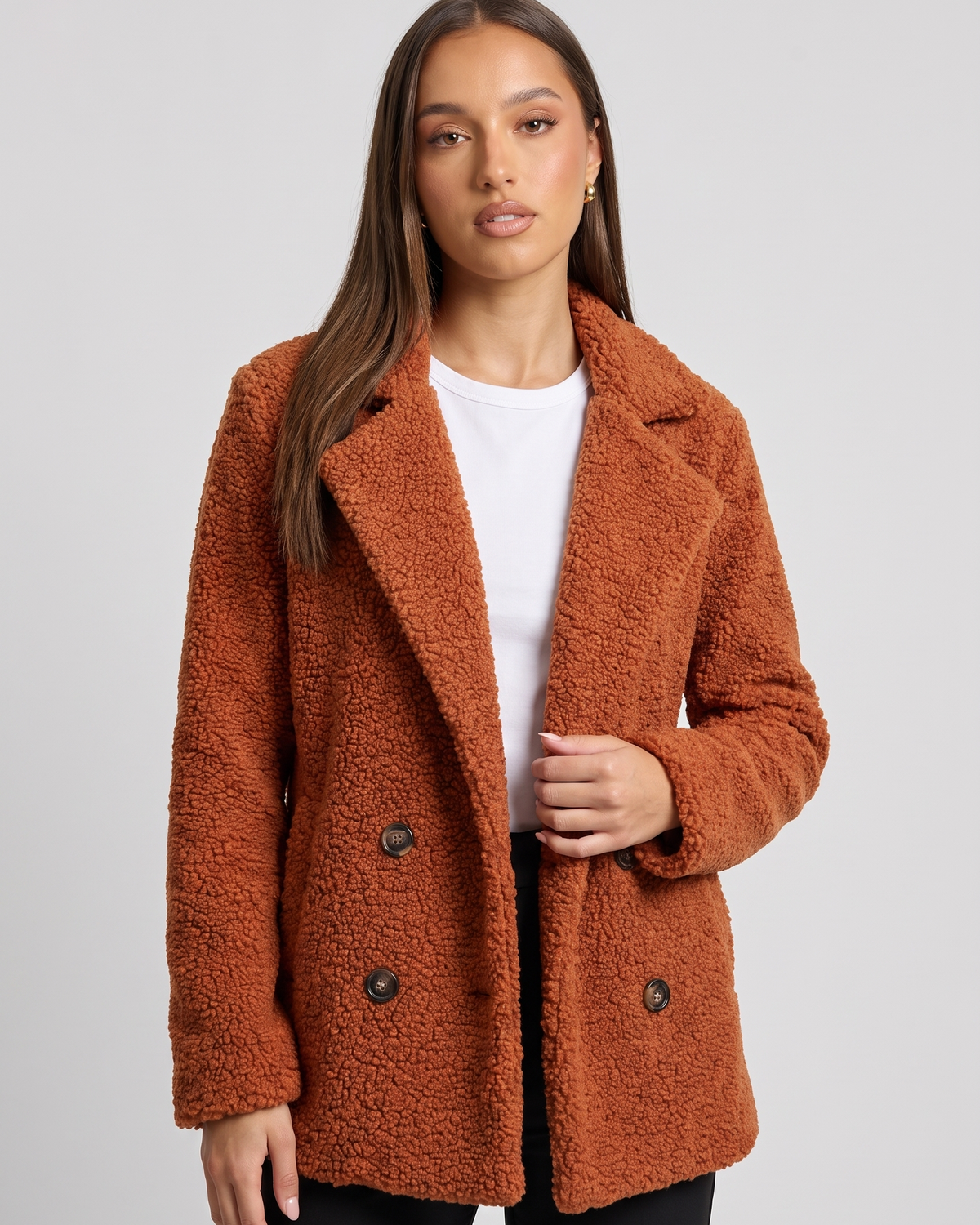 NOLA model wearing double breasted relaxed fit lapel jacket