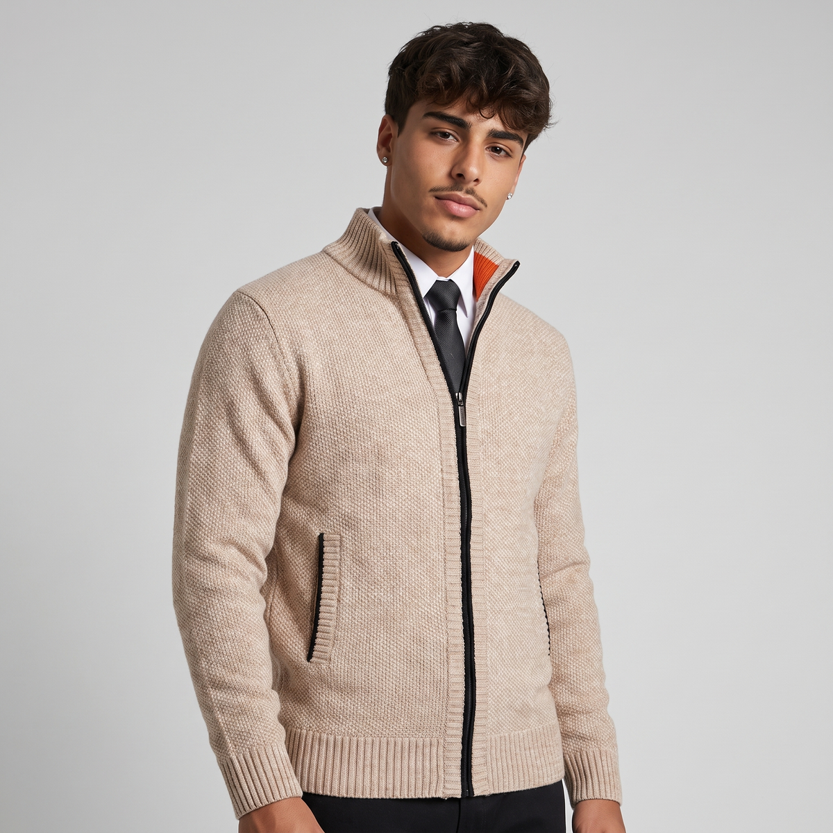 NOLA model wearing zip-up ribbed knit cardigan stand collar