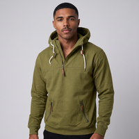 NOLA model wearing half-zip pullover hoodie kangaroo pocket