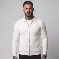 NOLA model wearing zip-up collared jumper white and black