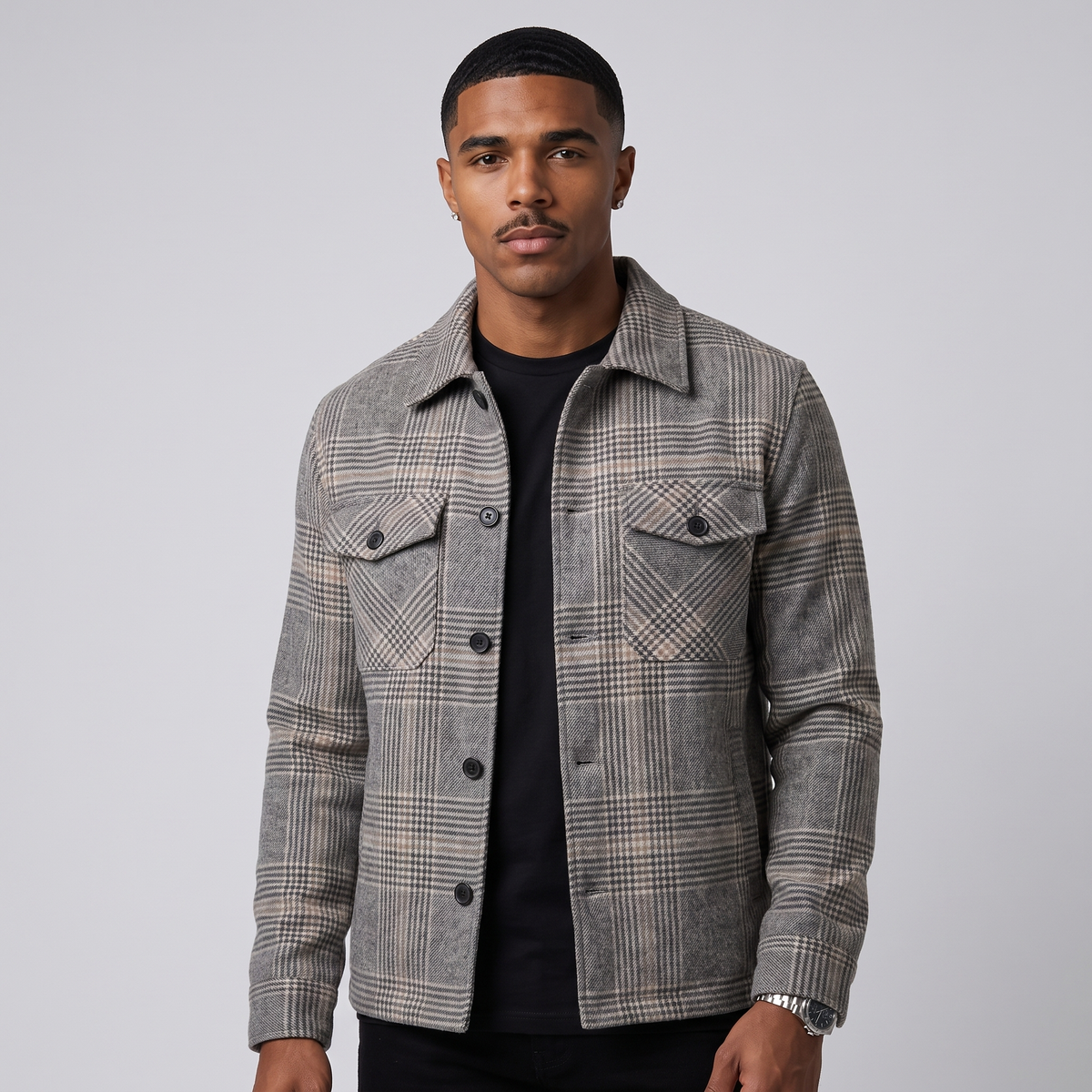 NOLA model wearing button-down plaid jacket grey and taupe