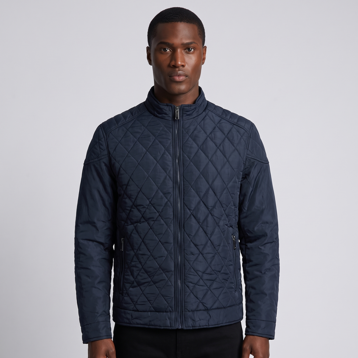 NOLA model wearing diamond quilted full zip jacket