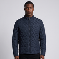NOLA model wearing diamond quilted full zip jacket