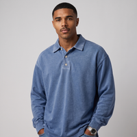 NOLA model wearing long sleeve button-down polo shirt