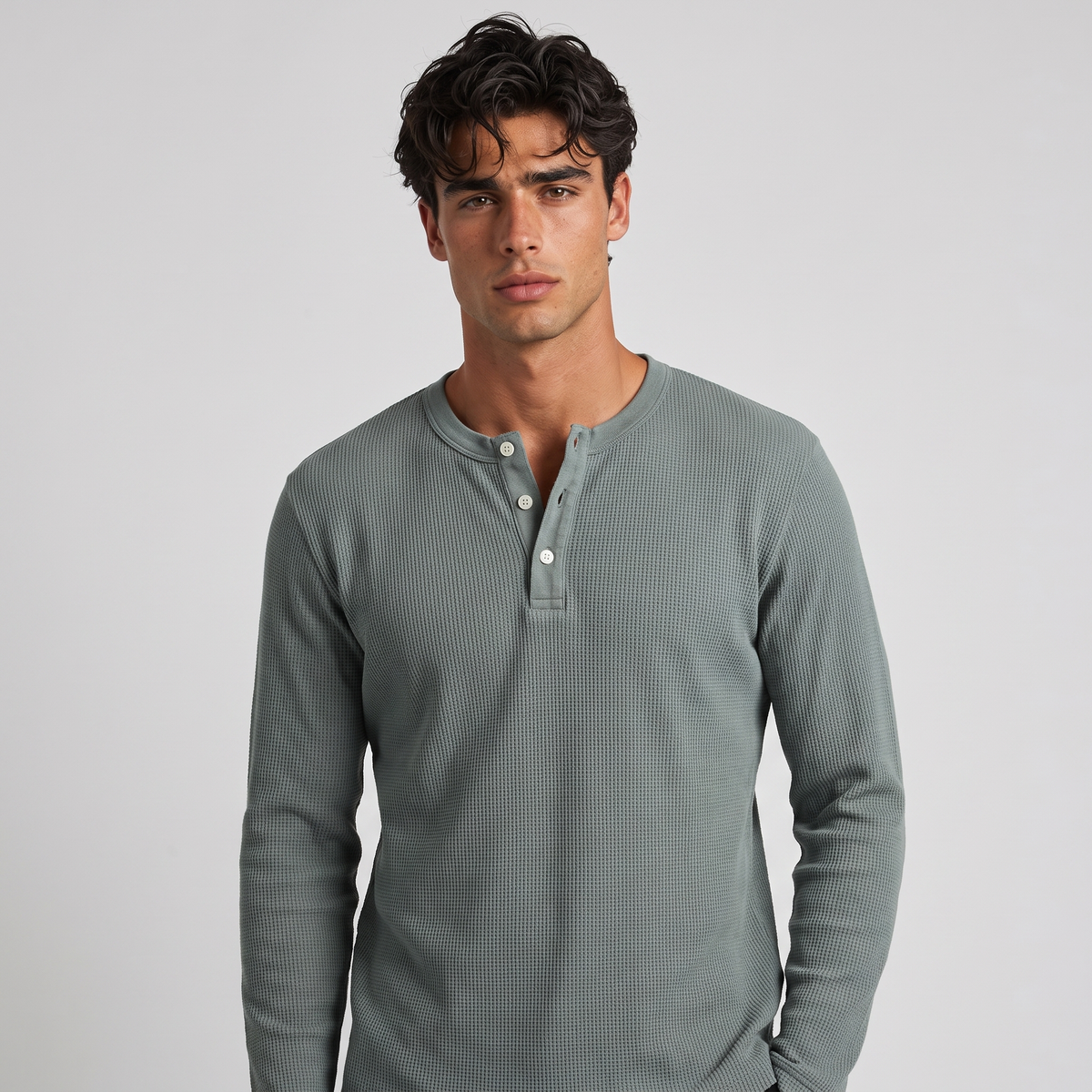 NOLA model wearing long sleeve henley shirt