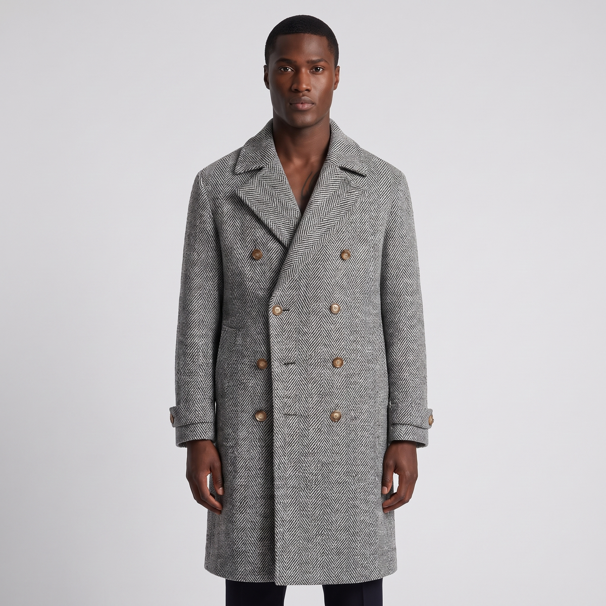 NOLA model wearing herringbone double breasted wool coat grey