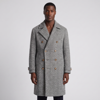NOLA model wearing herringbone double breasted wool coat grey