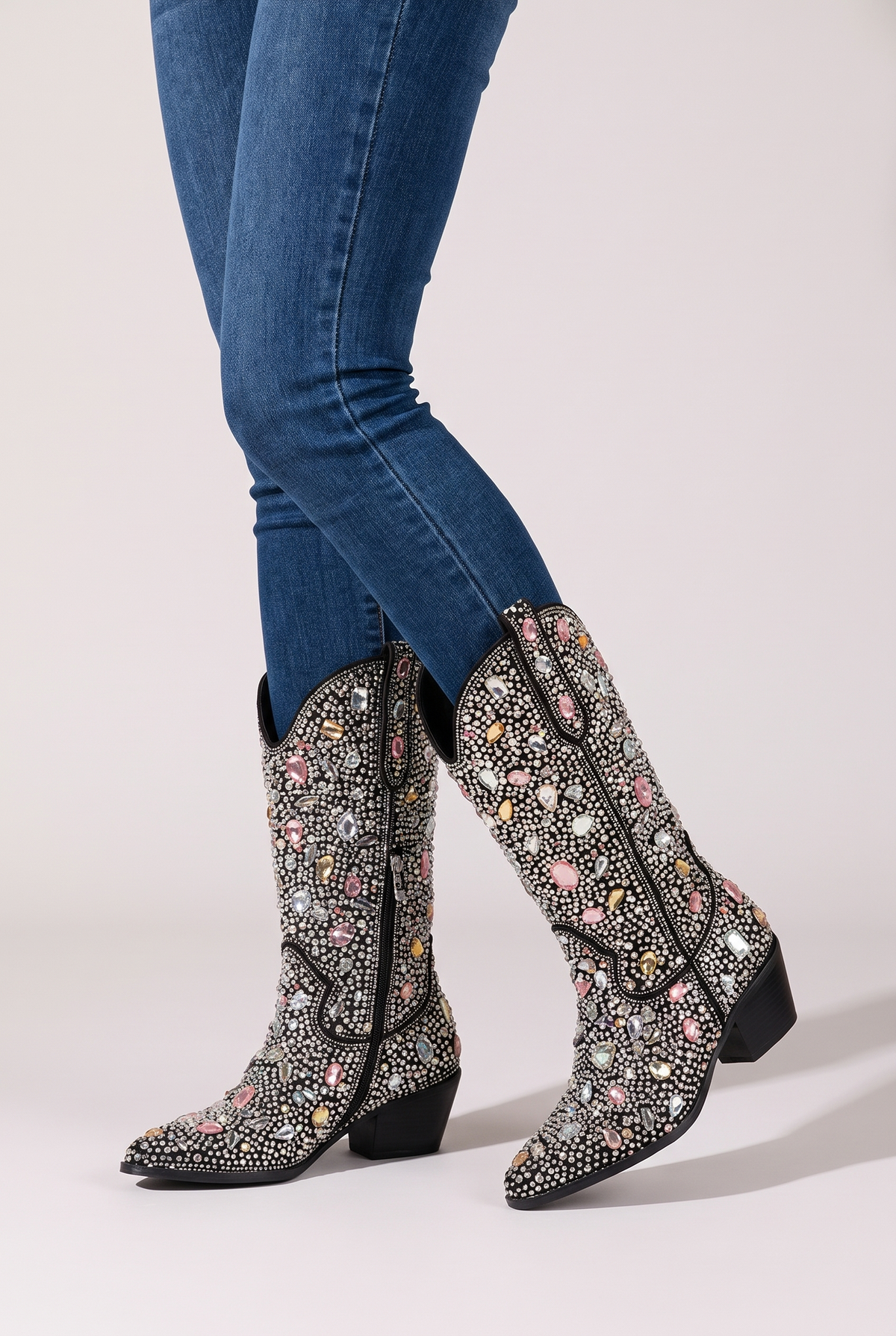 NOLA model wearing black rhinestone mid-calf cowboy boots