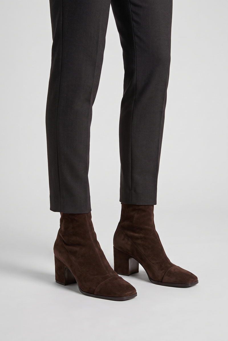 NOLA model wearing suede block heel ankle boots dark brown
