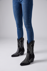 NOLA model wearing embellished mid-calf pointed toe boots black