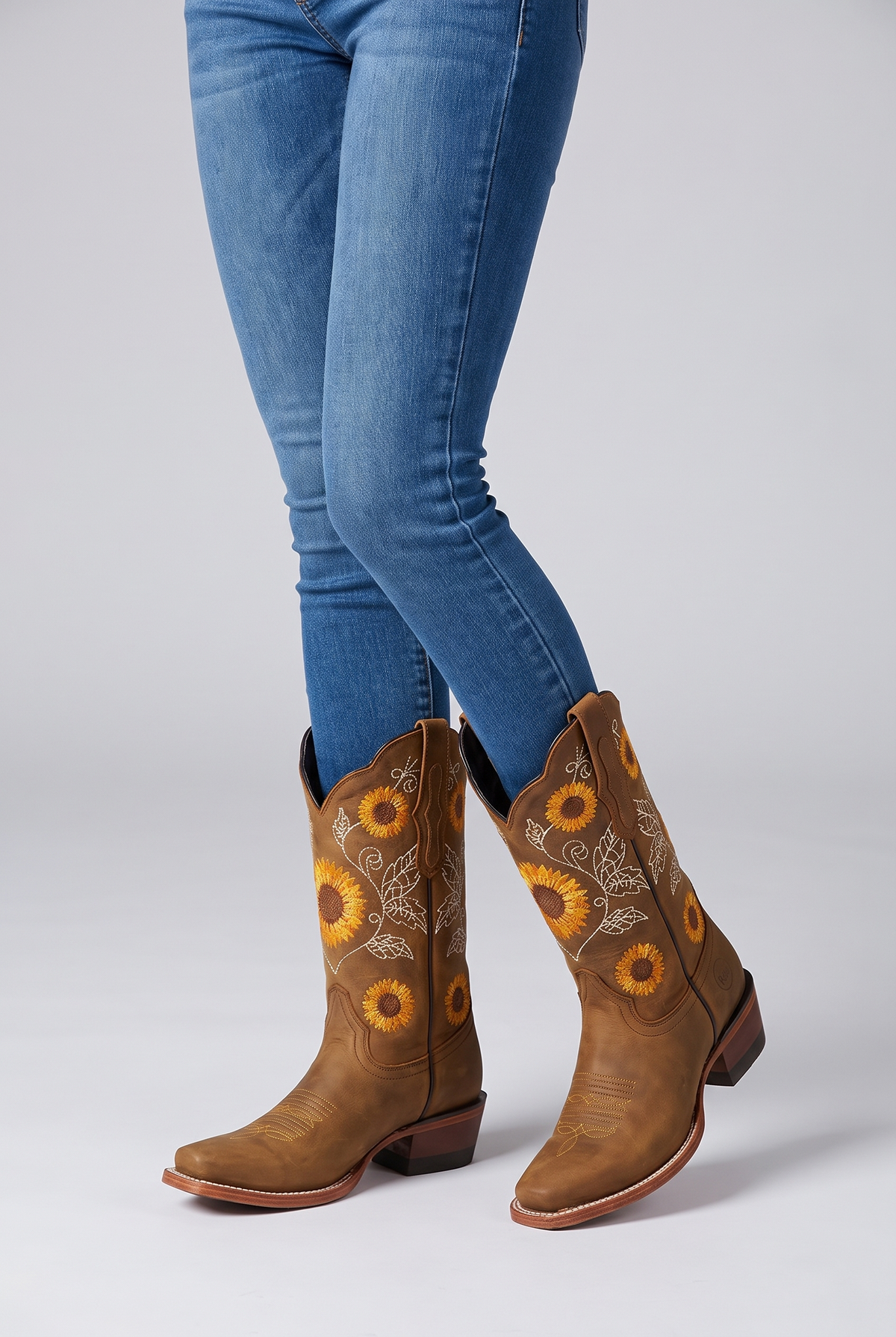 NOLA model wearing mid-calf boots