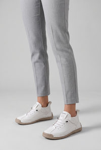 NOLA model wearing orthopedic stitched sneakers