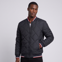 NOLA model wearing black diamond quilted bomber jacket