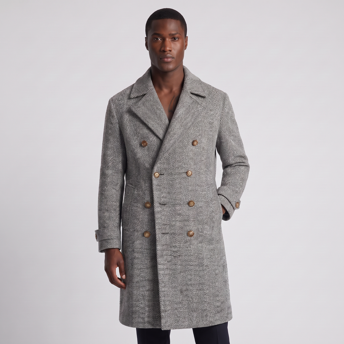 NOLA model wearing herringbone double breasted wool coat grey