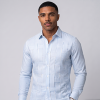 NOLA model wearing smart casual striped button up shirt