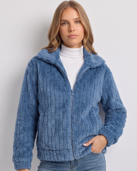 NOLA model wearing zip-up relaxed fit jacket blue