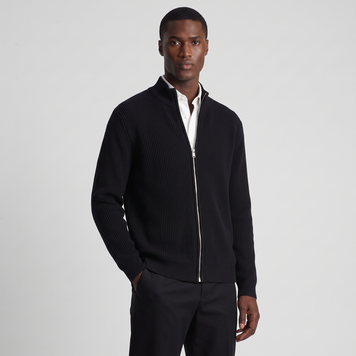 NOLA model wearing full-zip ribbed jumper stand collar premium pose