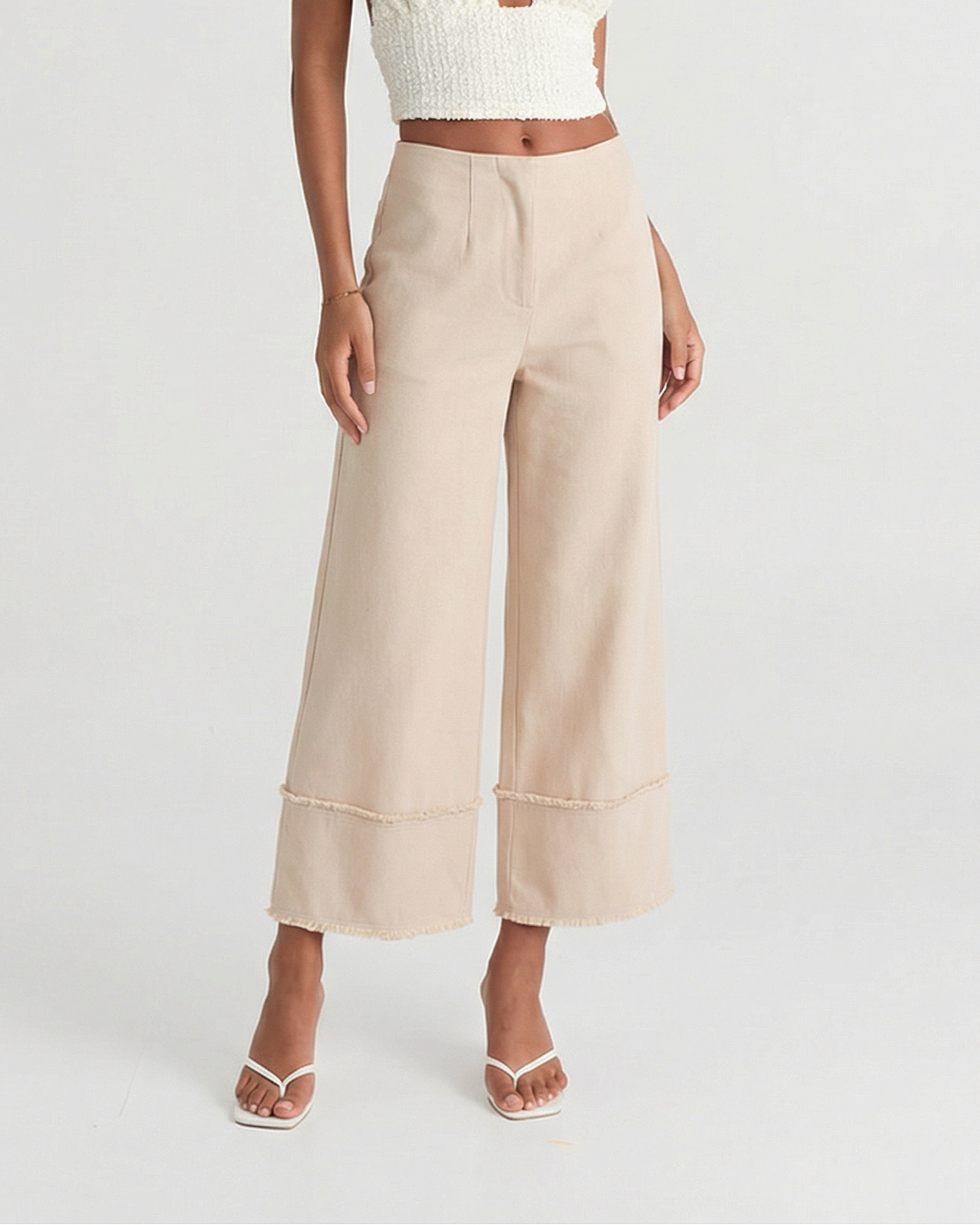 Paige | High-Waist Raw Hem Cropped Wide-Leg Cotton Trousers in Cream