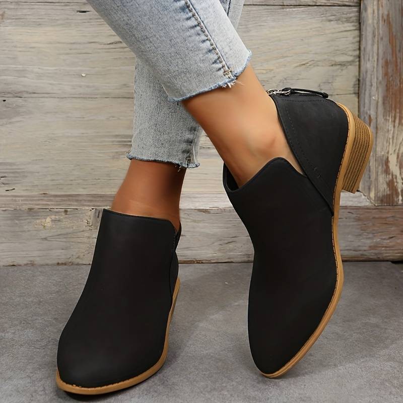 Delfina pointed toe ankle boots in Black