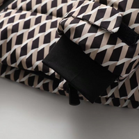 Malvina hooded belted puffer jacket detail view seven