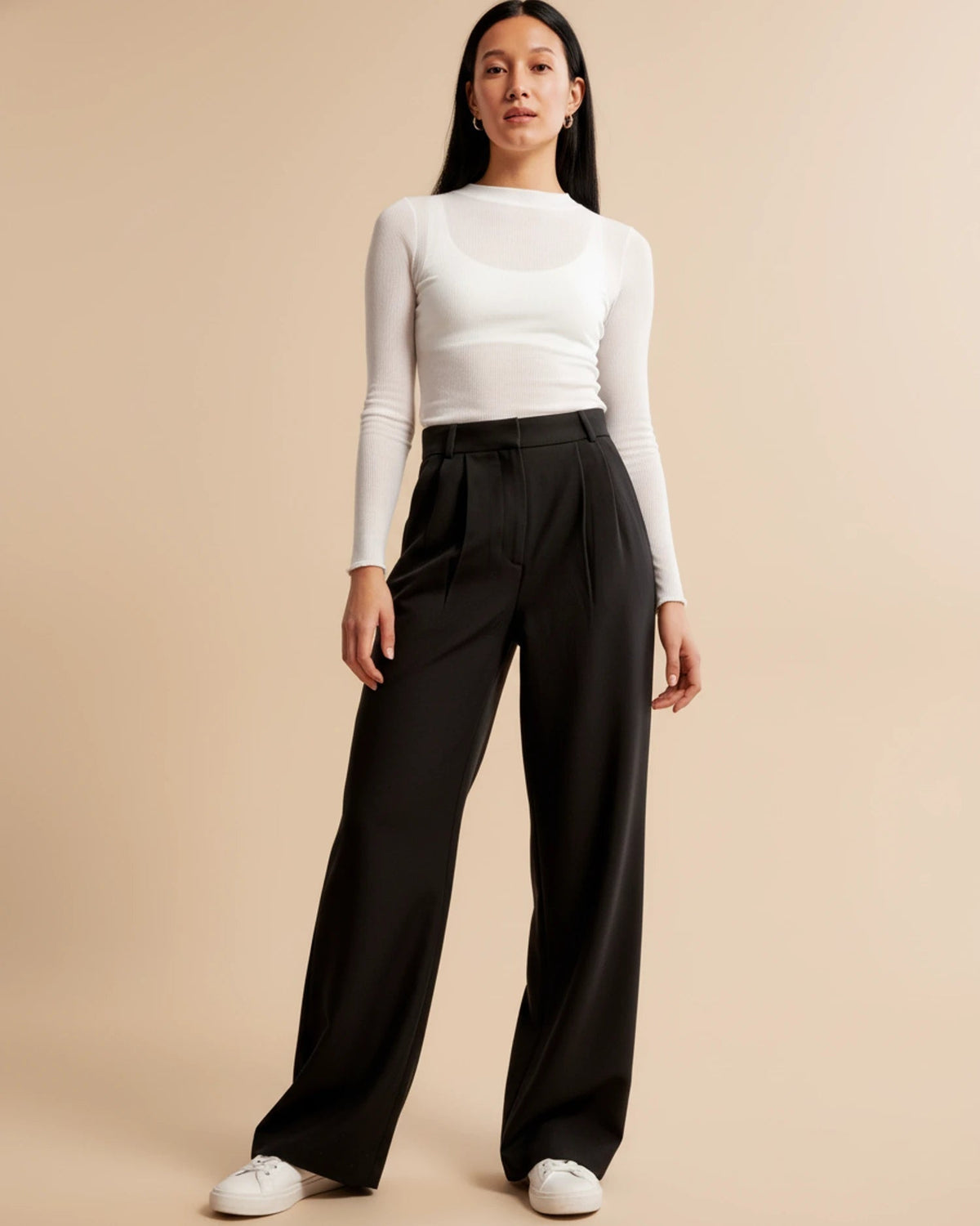 Jolanda high-waisted pleated wide leg trousers in Black